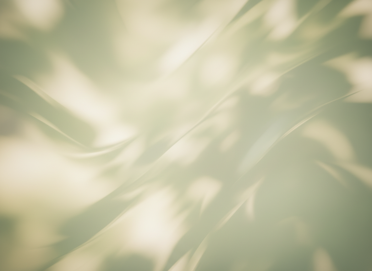 Soft sage green and cream light filtering through leaves